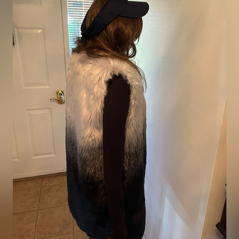 new with tags  Ombre Faux Fur Vest can be paired with jeans leggings or dress..